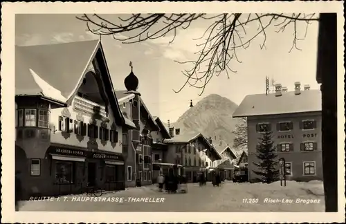 Ak Reutte in Tirol, Hauptstraße Thaneller, Friseur Adalbert Singer, Hotel Post
