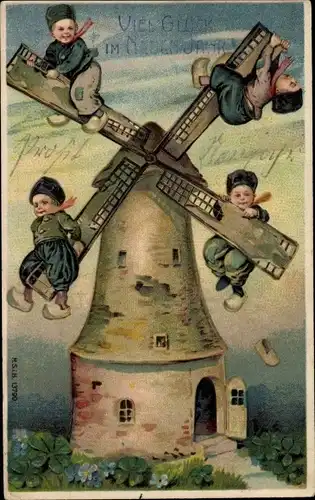 Präge Ak Glückwunsch Neujahr, Kinder in Niederländischer Tracht an Windmühlenflügeln, Klee