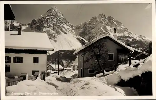 Ak Lermoos in Tirol, Winterpartie mit Sonnenspitze