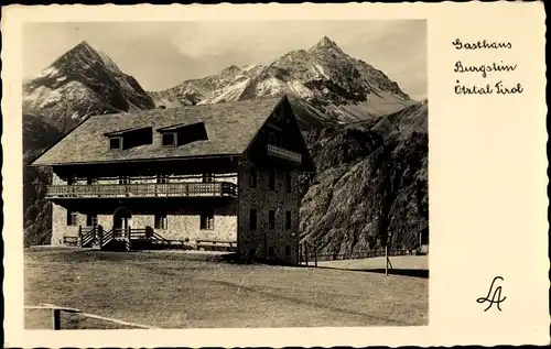 Ak Ötztal Tirol, Gasthaus Burgstein mit Gebirge im Hintergrund