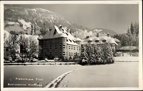 Ak Fieberbrunn in Tirol, Schlosshotel Rosenegg, Winteransicht