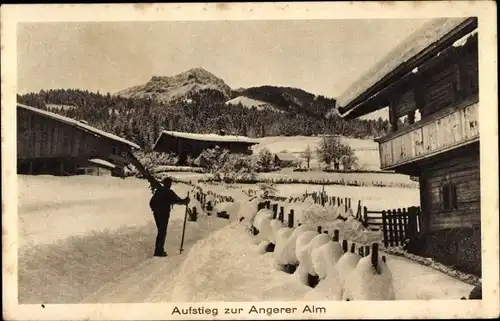 Ak Sankt Johann in Tirol, Aufstieg zur Angerer Alm, Mann mit Skiern