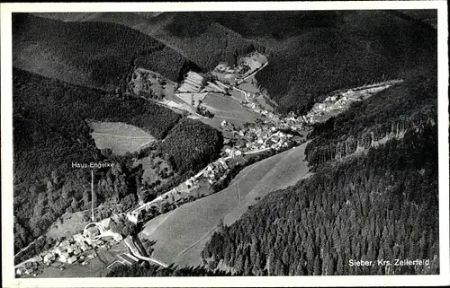 Ak Sieber Herzberg am Harz, Blick auf den Ort mit Umgebung, Haus Engelke, Fliegeraufnahme