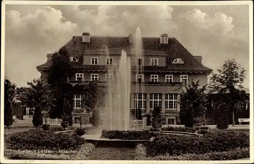 Ak Giżycko Lötzen Lözen Masuren Ostpreußen, Kurhaus, Inh. P. Essta, Springbrunnen