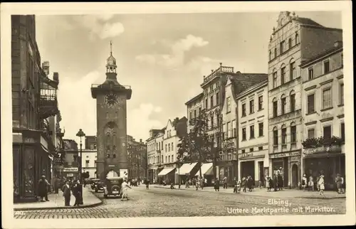 Ak Elbląg Elbing Westpreußen, Untere Marktpartie mit Markttor, Stehbierhalle, Geschäft E.G. Zweck