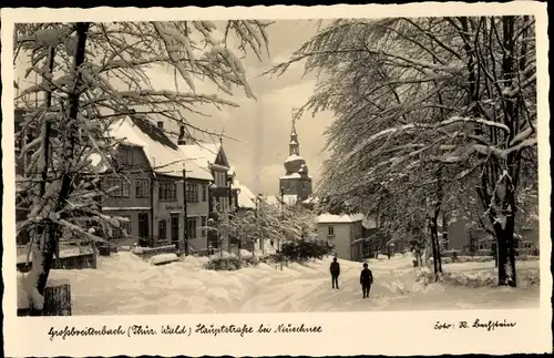 Ak Großbreitenbach im Ilm Kreis Thüringen, Hauptstraße bei Neuschnee, Kirche