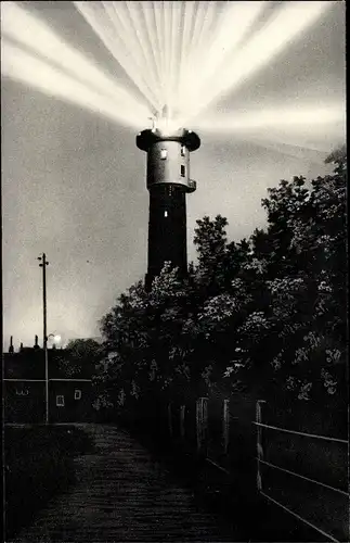 Ak Nordseebad Wangerooge in Ostfriesland, Leuchtturm bei Nacht