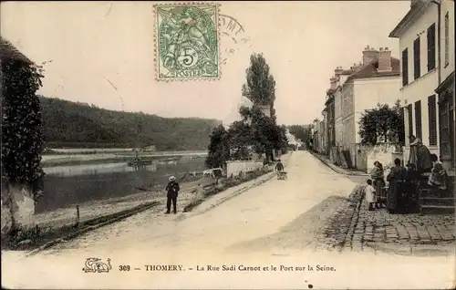 Ak Thomery Seine et Marne, La Rue Sadi Carnot, Le Pont sur la Seine