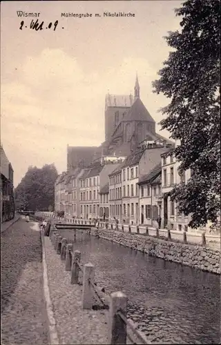 Ak Hansestadt Wismar, Mühlengrube mit Nikolaikirche