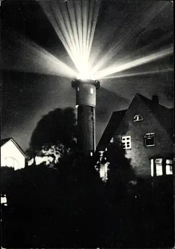 Ak Nordseebad Wangerooge in Ostfriesland, Leuchtturm bei Nacht