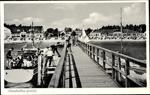 Ak Ostseebad Grömitz in Holstein, Landungsbrücke, Strand