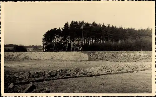 Foto Ak Reinharz Bad Schmiedeberg in der Dübener Heide, Straßenbau, Aufgefülltes Gelände