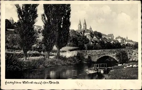 Ak Fritzlar in Hessen, Blick vom Ufer zur Stadt