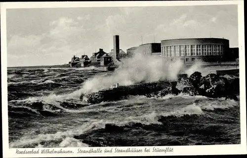 Ak Wilhelmshaven in Niedersachsen, Strandhalle und Strandhäuser bei Sturmflut