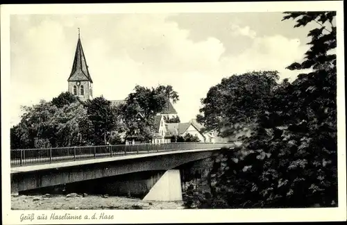 Ak Haselünne Hase Kreis Emsland, Blick auf den Ort von der Brücke aus, Kirche