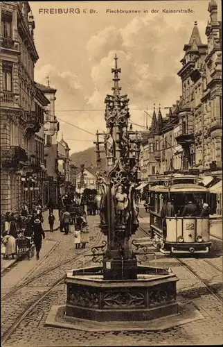 Ak Freiburg im Breisgau, Fischbrunnen in der Kaiserstraße, Straßenbahn