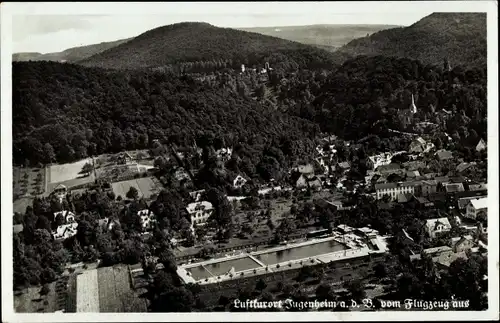 Ak Jugenheim an der Bergstrasse Hessen, Fliegeraufnahme vom Ort mit Freibad