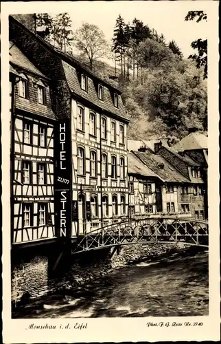 Ak Monschau Montjoie in der Eifel, Hotel Zum Stern mit Brücke, Fachwerkhaus