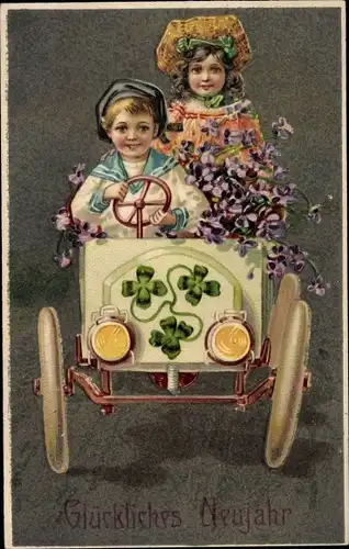 Präge Ak Glückwunsch Neujahr, Kinder im Auto, Kleeblätter, Veilchen