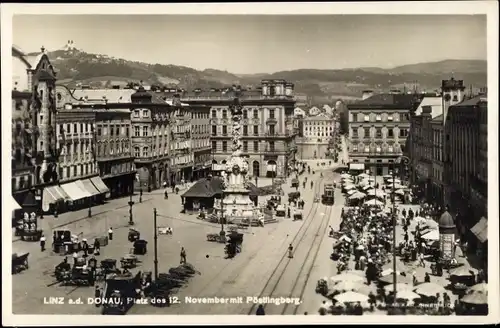 Ak Linz an der Donau Oberösterreich, Platz des 12. November mit Pöstlingberg