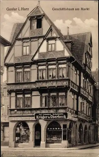 Ak Goslar am Harz, Geschäftshaus am Markt, Krüger & Oberbeck