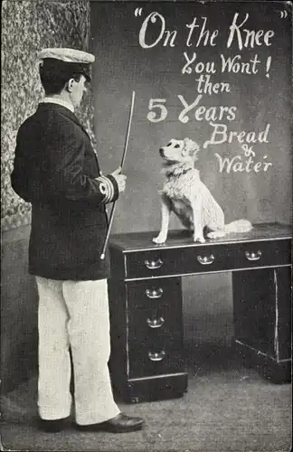 Ak On the Knee, You won't, then 5 years bread and water, Mann erzieht Hund auf Schreibtisch