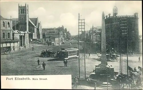 Ak Port Elizabeth Südafrika, Main Street, Obelisk, Straßenbahn