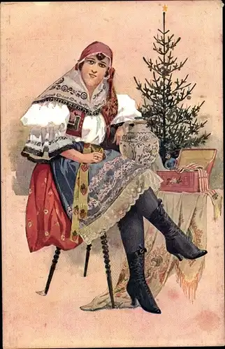Ak Frohe Weihnachten, Tannenbaum, Frau in tschechischer Tracht, Geschenke