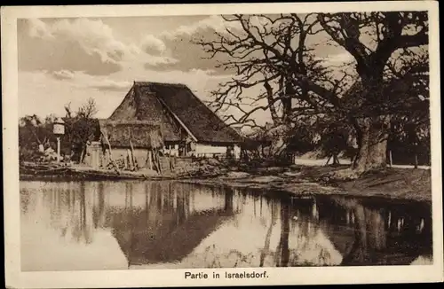 Ak Israelsdorf Hansestadt Lübeck, Bauernhaus vom Wasser aus gesehen