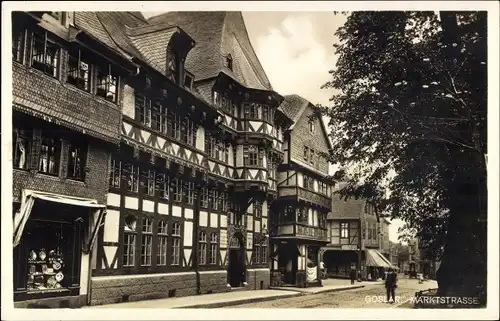 Ak Goslar am Harz, Blick in die Marktstraße mit Geschäften, Fachwerkhäuser