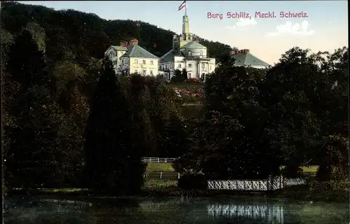 Ak Burg Schlitz Hohen Demzin Mecklenburgische Schweiz, Blick über den See zum Herrenhaus