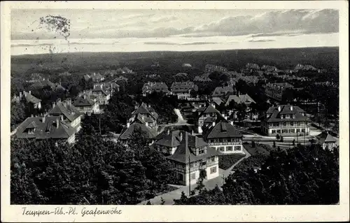 Ak Grafenwöhr in Bayern, Blick über den Truppenübungsplatz auf den Ort