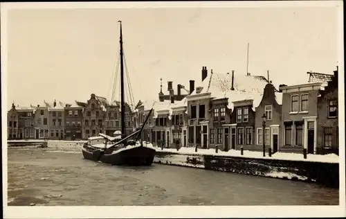 Foto Ak Goes Zeeland Niederlande, Teilansicht im Winter, Segelboot