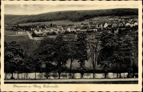 Ak Kreiensen Einbeck, Teilansicht der Ortschaft, Wald, Fluss