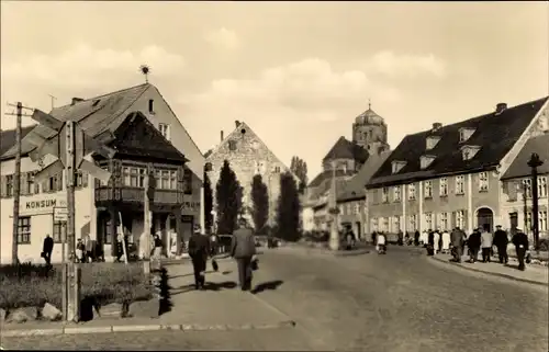 Ak Wolgast in Mecklenburg Vorpommern, Straßenpartie in Ortschaft, Konsum