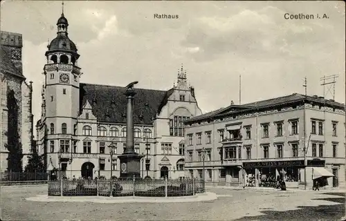 Ak Köthen in Anhalt, Rathaus, Geschäft, Kriegerdenkmal
