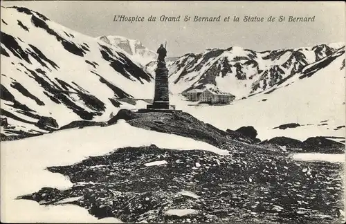 Ak St Bernard Sankt Bernhard Kanton Wallis, L'Hospice du Grand St.Bernard, Statue St. Bernard