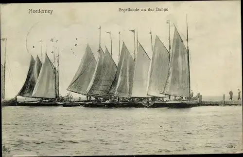Ak Norderney in Ostfriesland, Segelboote an der Buhne