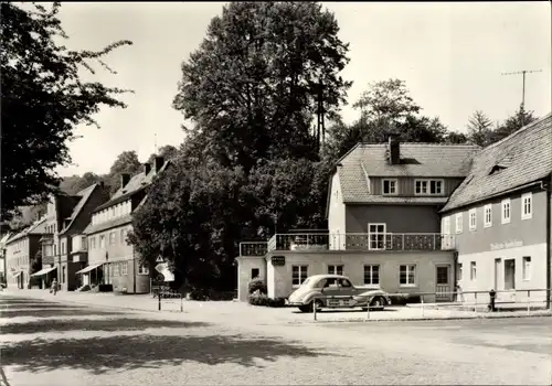 Ak Berggießhübel in Sachsen, Blick in die Karl Marx Straße, Bäckerei, Automobil