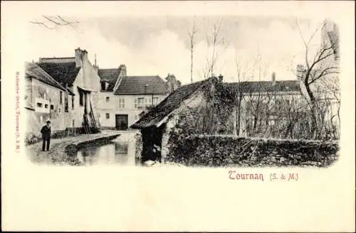 Ak Tournan Seine et Marne, Ortspartie, Fluss, Häuser