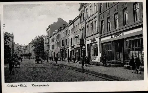Ak Stolberg im Rheinland, Blick in die Rathausstraße, Geschäfte E. Monas, Schüller, Passanten