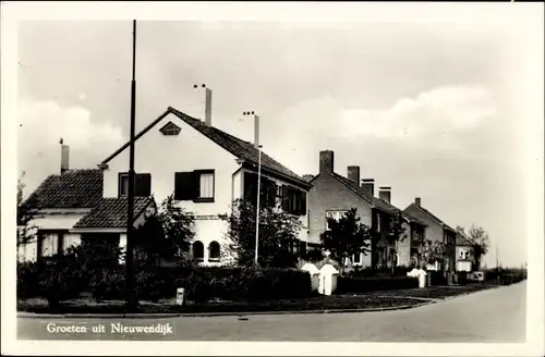 Ak Nieuwendijk Nordbrabant, Straßenpartie, Wohnhäuser