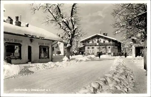 Ak Oberaudorf am Inn Oberbayern, Dorfstraße im Winter, Gasthof, Geschäft