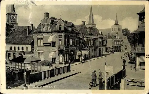 Ak Heerenveen Friesland, Nieuwe Hoofdbrug, Brücke, Straßenpartie, Geschäfte