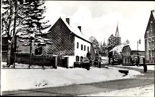 Ak Mechelen Limburg, Hoofstraat in wintertooi, Winter, Straßenpartie