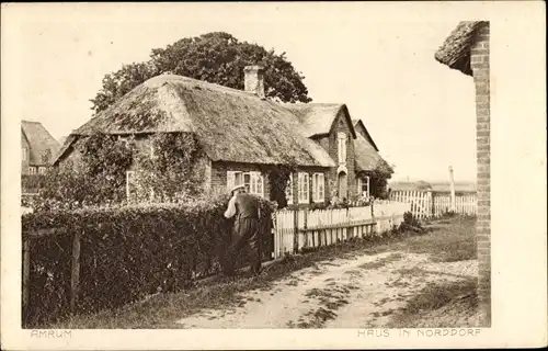 Ak Norddorf auf Amrum Nordfriesland, Haus mit Reetdach