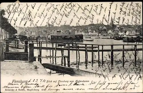 Ak Flensburg in Schleswig Holstein, Blick auf den Ort vom Hafendamm aus