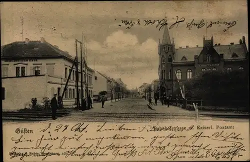 Ak Güsten in Anhalt, Bahnhofstraße, Kaiserliches Postamt, Bahnübergang, Hotel Deutsches Haus