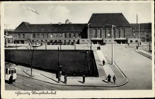 Ak Gliwice Gleiwitz Oberschlesien, Hauptbahnhof, Straßenbahn