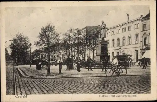 Ak Krefeld am Niederrhein, Ostwall, Moltke Denkmal, Radfahrer